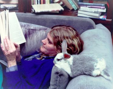 [Image: S. D. Youngren reading to her rabbit Wentworth.]